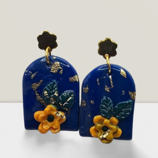 Midnight Bloom Arch Earrings – Navy Blue Resin with Yellow Floral Accents