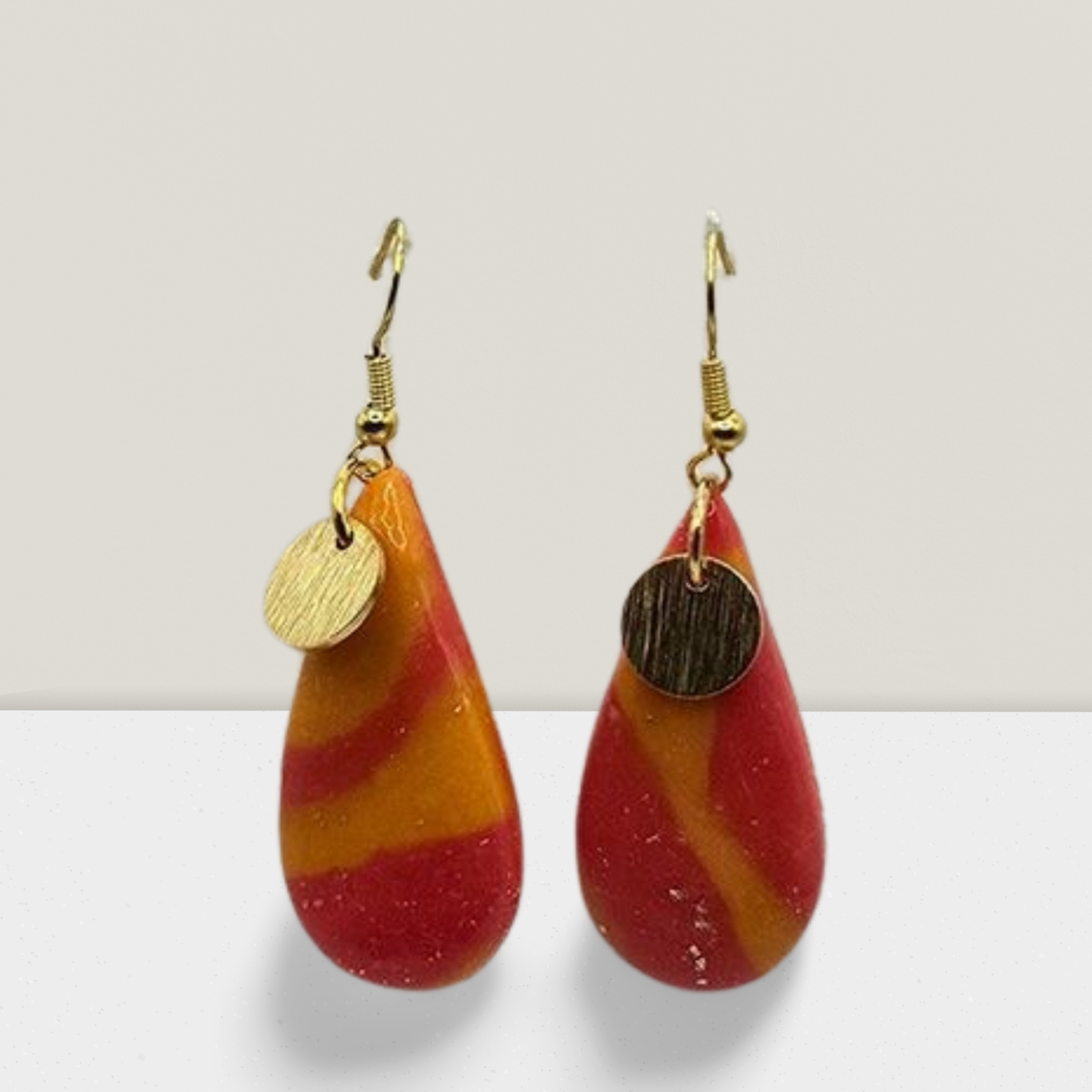 Sunset Swirl Teardrop Earrings – Red & Orange with Gold Disc Charm